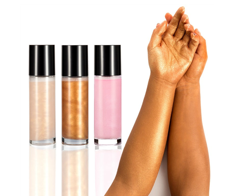Ready? Set? GLOW! Our Face and Body Shimmer Highlighting Spray is the perfect multi-purpose shimmer spray. A beautiful bronze gold liquid to prime, set and glow. A fine mist with reflective particles that will give you a glimmering dewy finish. Step into the spotlight this season, a legit all-day glow in just a couple of spritzes. Can be hot stamped with your logo! Inquire at info@tashcosmetics.com