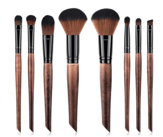 Our gorgeous 8 pc Crafted Wood Handle Makeup Brush Set will ensure you have a brush for every makeup need. An 8 Piece Brush Set, a complete collection of essential face and eye brushes that make it easy to sweep, smooth, smudge and highlight. The professional quality brushes are designed with sleek, chic wood handles and durable, densely packed synthetic bristles. Ideal for use with liquids, creams and powders, the assortment offers perfect precision and expert blending to create polished full-face looks ev