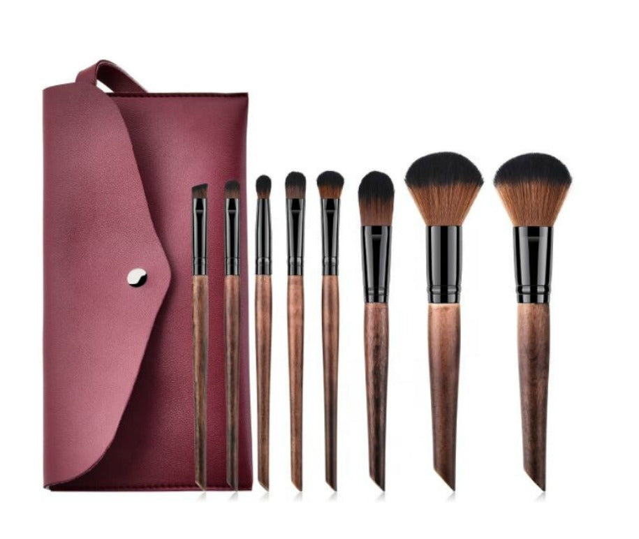 Our gorgeous 8 pc Crafted Wood Handle Makeup Brush Set will ensure you have a brush for every makeup need. An 8 Piece Brush Set, a complete collection of essential face and eye brushes that make it easy to sweep, smooth, smudge and highlight. The professional quality brushes are designed with sleek, chic wood handles and durable, densely packed synthetic bristles. Ideal for use with liquids, creams and powders, the assortment offers perfect precision and expert blending to create polished full-face looks ev